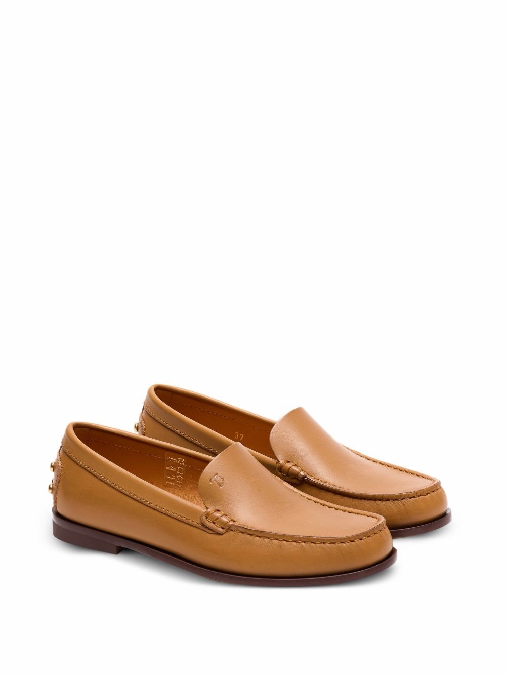 Tod’s tan round toe loafers